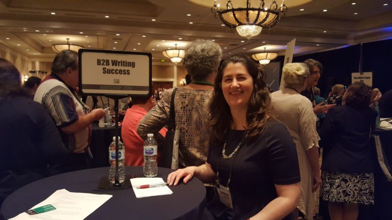 Dr. Tammy Powell hosting a table at AWAI's Job Fair and Bootcamp